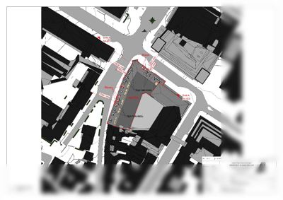 Situasjonsplan som viser bygningens plassering i forhold til nabolaget, veier og andre bygninger.