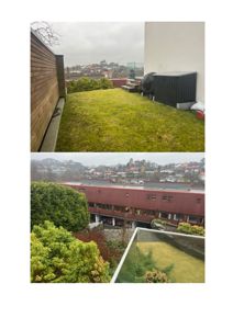 Fotografier av en terrasse eller hage med utsikt over nabolaget og en nabobygning.