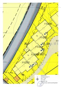 Situasjonskart som viser tomtene (11/252, 11/254 osv.) langs Herregårdsvegen 15 med bygningsplasseringer og grenser.
