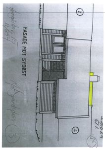 Fasadetegning av en bygning sett fra sydøst, med håndskrevne notater om 'FASADE MOT SYDØST' og 'Mot gardspass'.