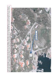 Flyfoto av et boligområde med overlagte tekstbeskrivelse og en markert adresse (Vestre Veien 282).