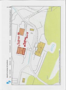 Kartutsnitt (situasjonsplan) som viser tomt, vegnett og bygningsfotavmerking.