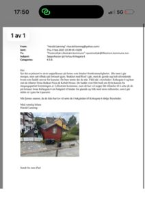 Fotografi av en rød bygning med søppelkasser foran, tatt fra gaten.