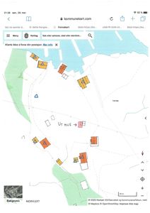 Et digitalt kart (kommunekart) som viser eiendomsforhold, bygninger og grunntyper i et område.