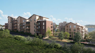 3D-visualisering av et planlagt boligprosjekt med flere etasjer, balkonger og en havn i bakgrunnen.