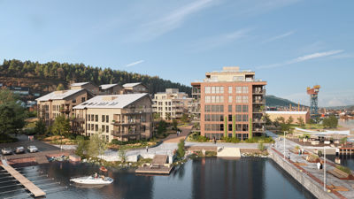 3D-visualisering av et planlagt boligkompleks ved vannet