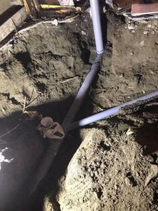 Fotografi av rør i grøft under en byggeprosess