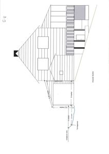 Fasadetegning (opprikk) av en bygning sett fra nord, med angitte mål for takhøyde og tomtegrenser.