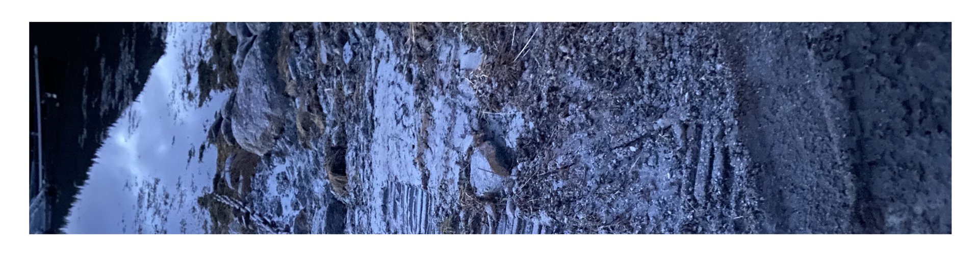 Et fotografi som viser en snødekt bakke eller terreng, muligens et utsnitt fra et større prosjekt.