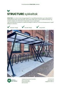 Fotografi av et sykkelteak (takoverbygg for sykkelparkering) montert mot en mur.