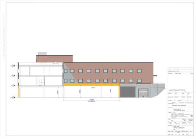 Snittegning som viser tverrsnittet av en bygning med romfordeling og mål.
