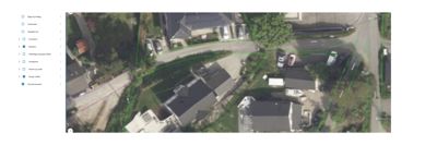 Satellittbilde (flyfoto) av et boligområde med overlagte grønnfargede linjer som markerer eiendomsgrenser og byggefelt.