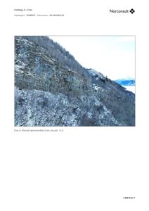 Fotografi av et snødekt fjellområde med skog og utsikt over vann i bakgrunnen. Bildet er merket som 'Vedlegg 3 – Foto' og viser 'Øverste lasneområde'.