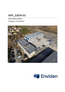 Luftfoto av en industribygning med omgivende terreng og parkeringsplass.