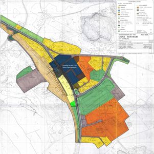 Reguleringsplan for Ognå sentrum som viser arealbruksplanlegging med farger for ulike soner (bolig, industri, grøntområder) og infrastruktur.