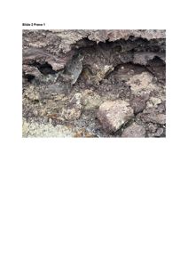 Fotografi av en jordprøve med steinblokker, sannsynligvis fra en grunnundersøkelse.