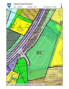 Situasjonsplan som viser tomtedeling, arealbruk og infrastruktur (veier) i et område.