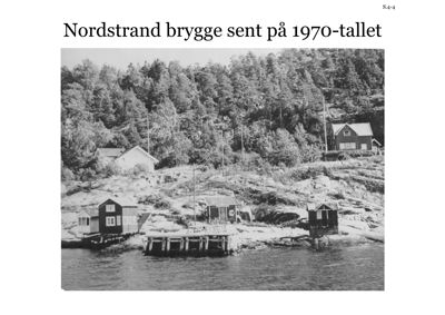 Sort-hvitt fotografi av Nordstrand brygge med små hytter og en brygge fra slutten av 1970-tallet.